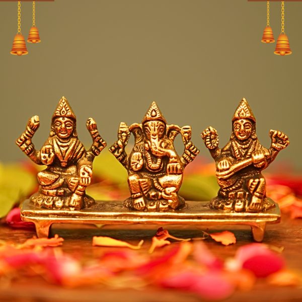 Ganesha with Laxmi and Saraswati
